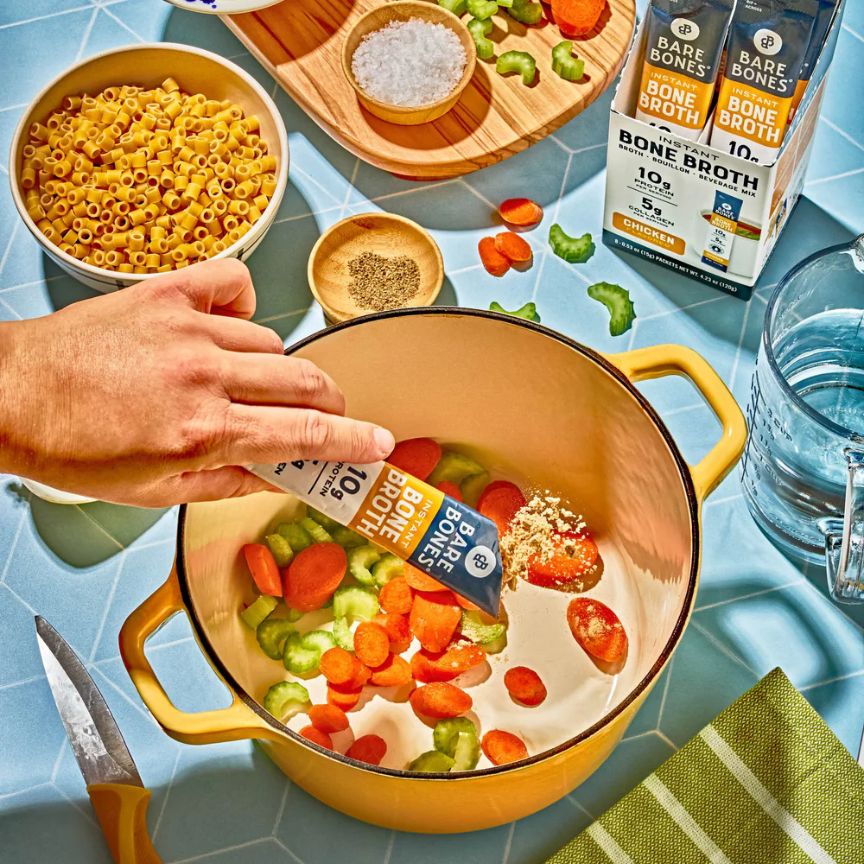 dumping a packet of bare and bones into food