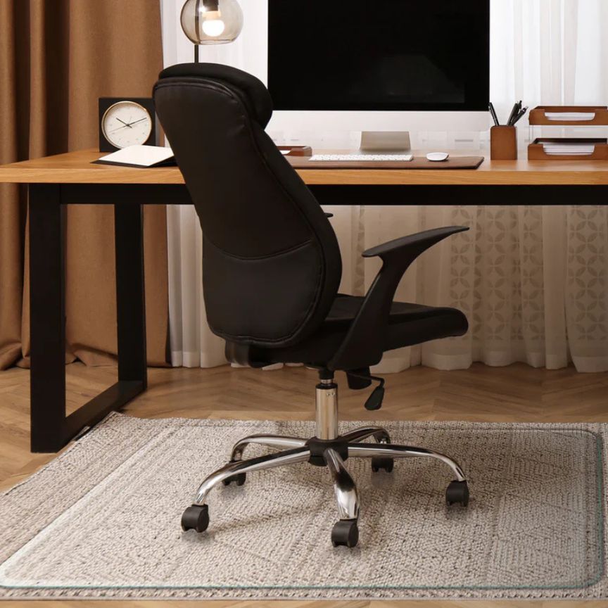 office chair on glass mat